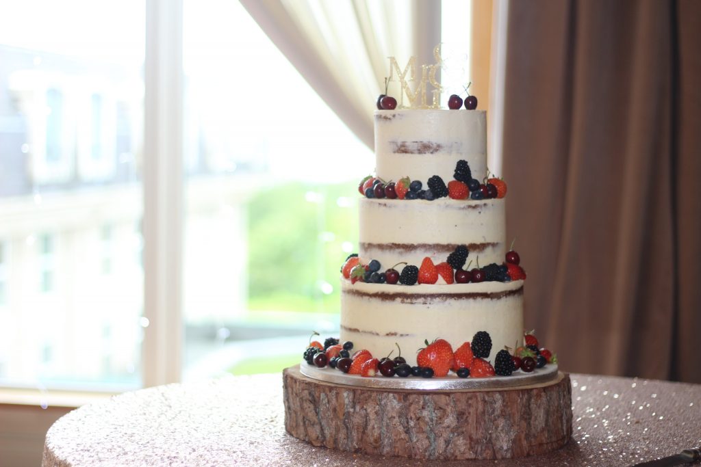 Semi Naked Wedding Cake Decorated With Fresh Fruit