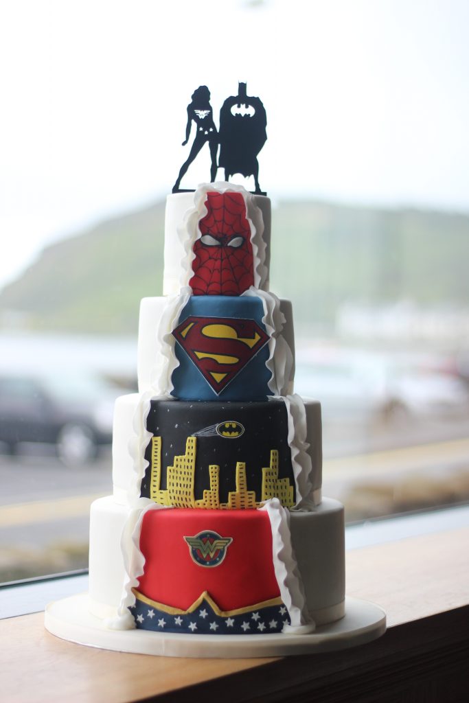 Superheroes Wedding Cake With Black Acrylic Topper